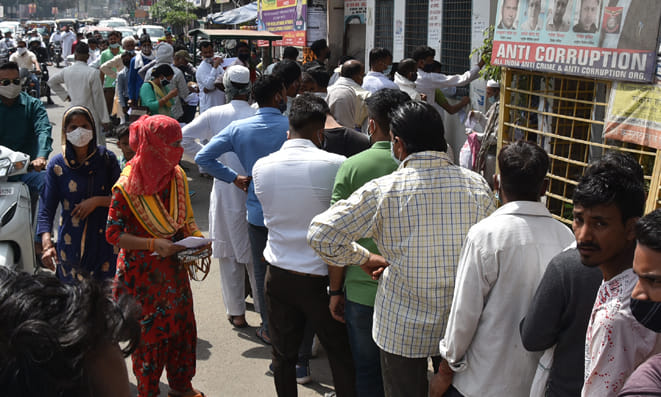 Line outside banks, social distancing is not being followed