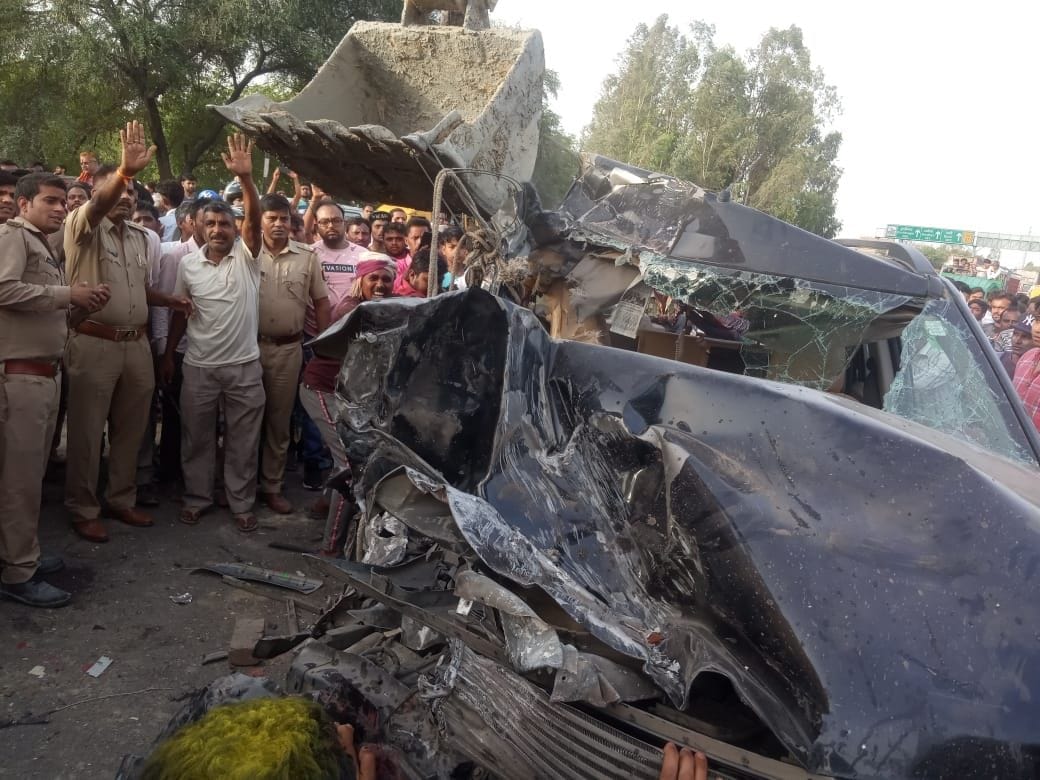 Two killed in bus and car collision