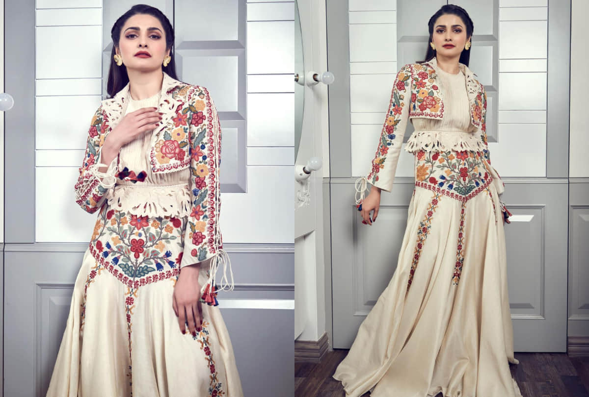prachi desai wear ivory shade skirt with top diana penty mustard kaftan which look impressive