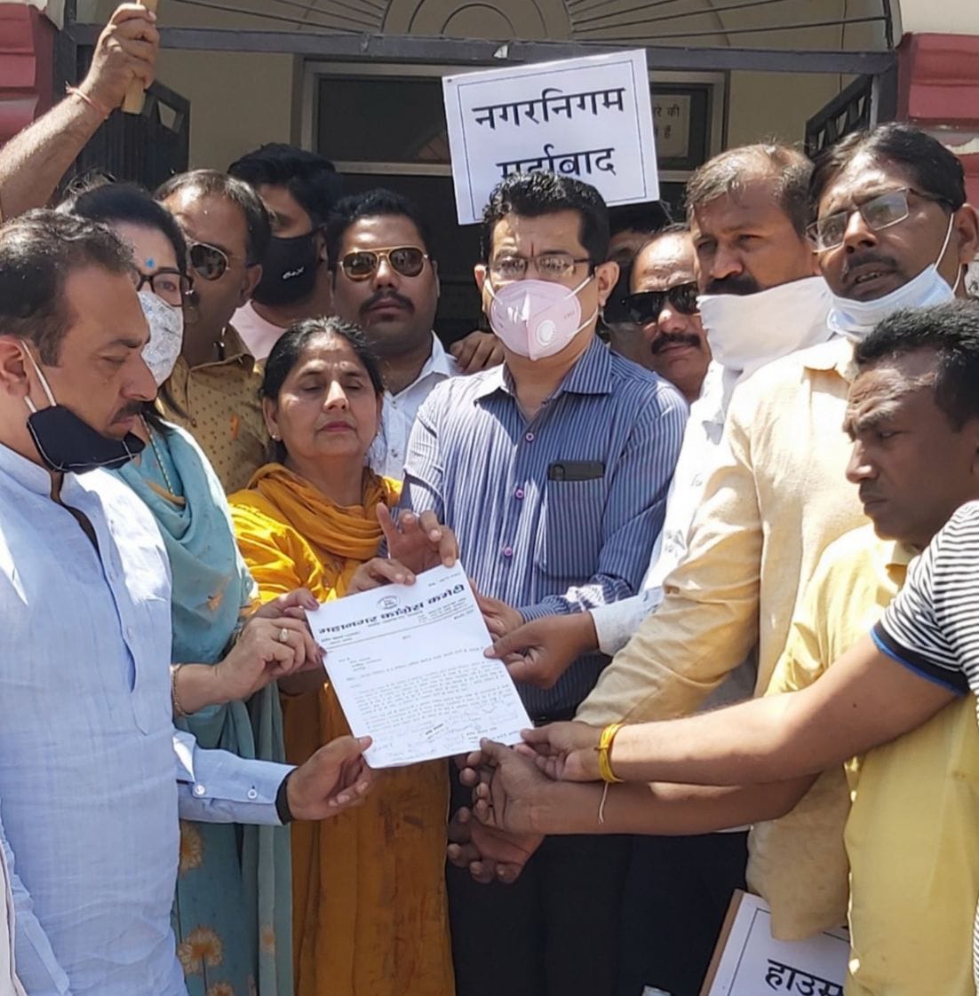People protested against increasing  house tax