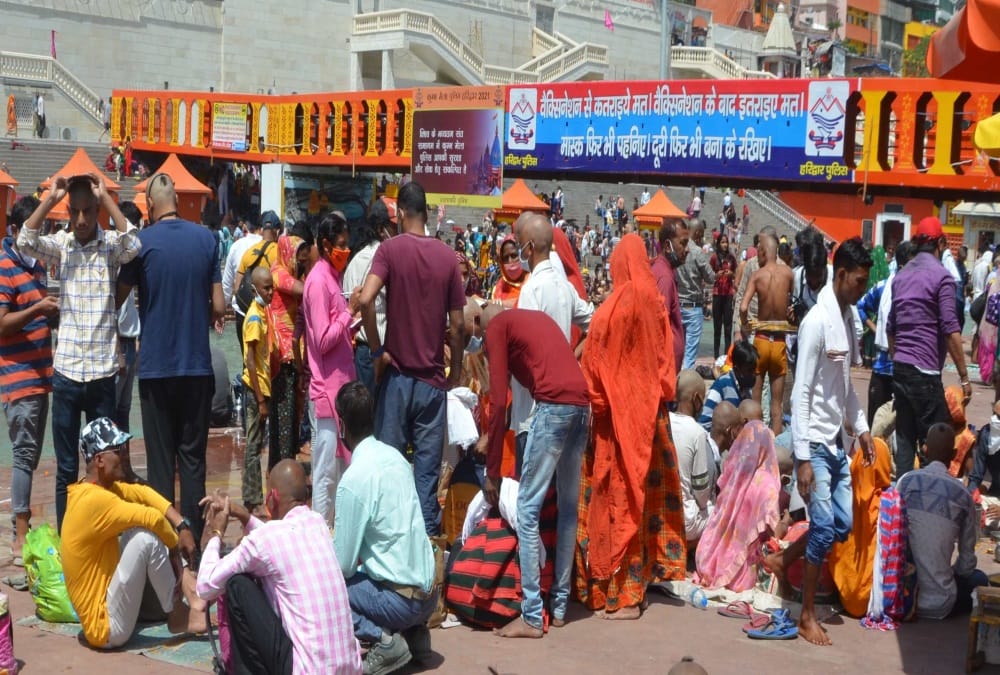 Haridwar Maha Kumbh 2021: Covid 19 Rules Broken, Devotees seen Without mask and Social Distancing photos