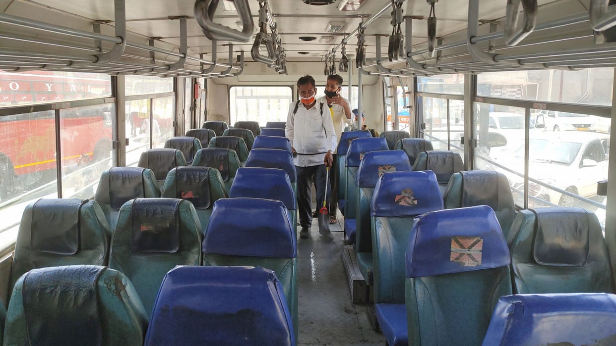 Corporation management sanitizing buses