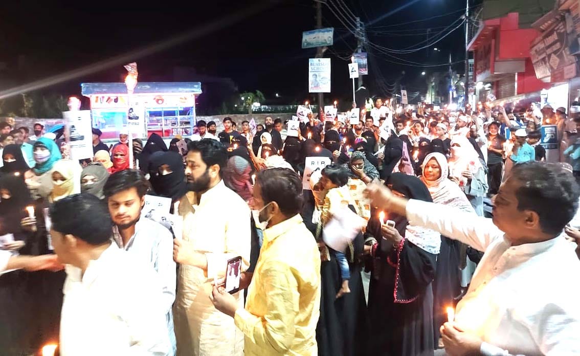 Candle march organized to protest the killing of the girl