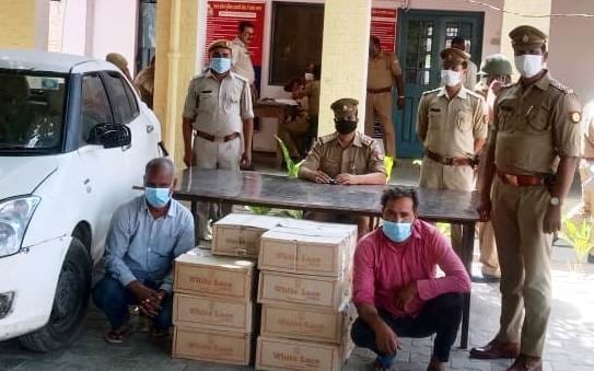 15 carton wine seized, two arrest