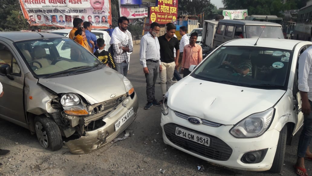 Cars collided, four injured including woman