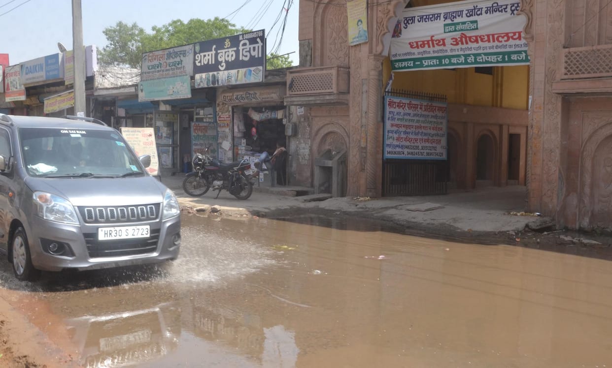 Water drains in front of the historic Khonta temple