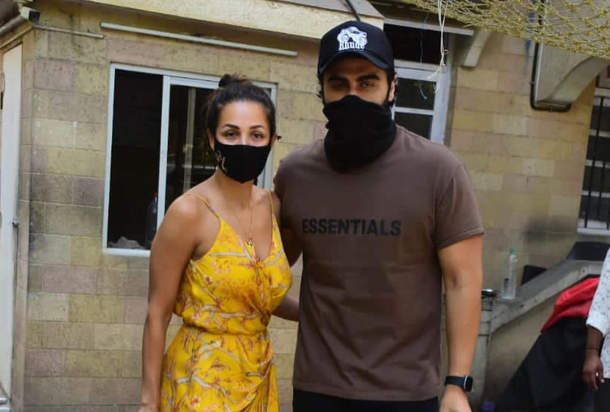 malaika arora celebrates easter with mother and boyfriend arjun kapoor look hot in backless floral maxi dress