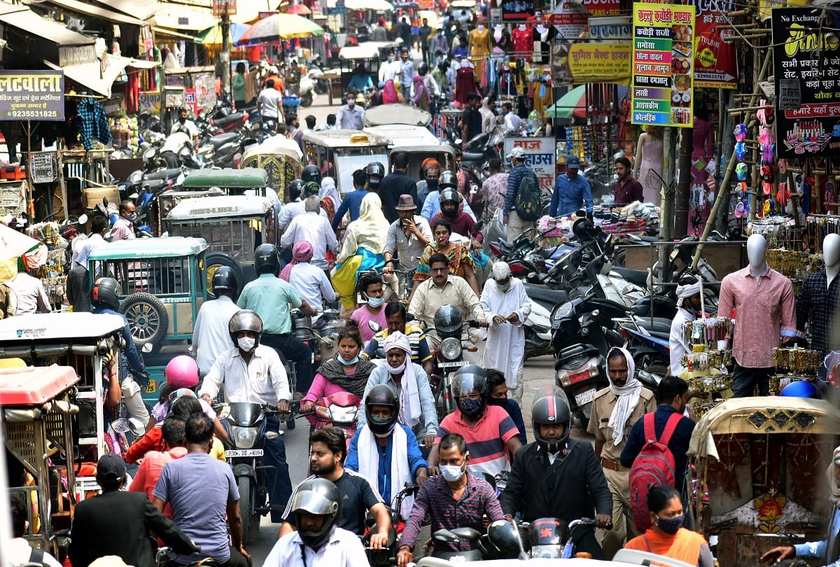 Why is Covid-19 surge rapidly in India? identify 4 reasons
