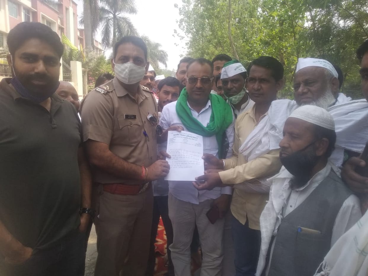 Farmers protest in front of the school for blocking the drainage
