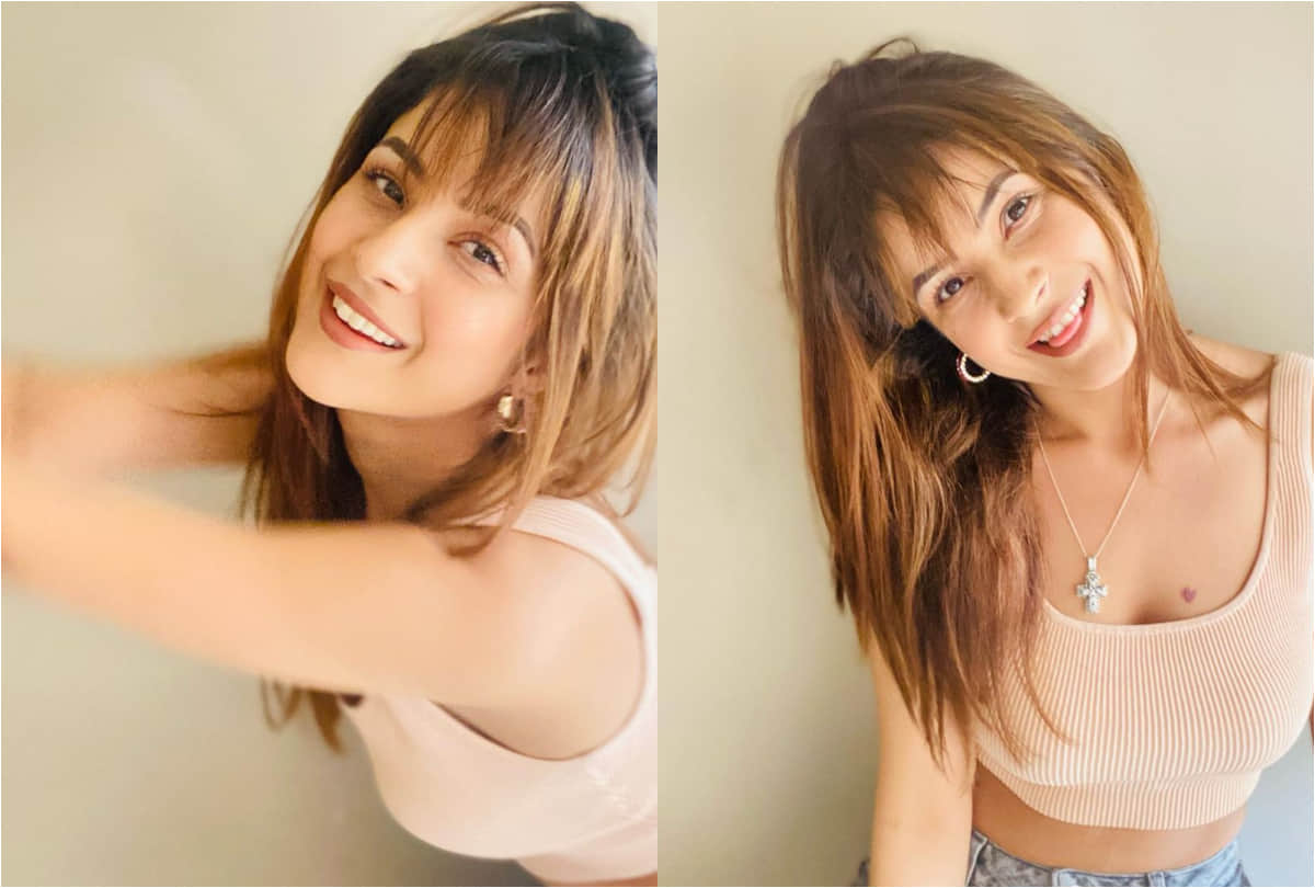 shehnaz gill flaunts new hair cut with bangs and toned abs