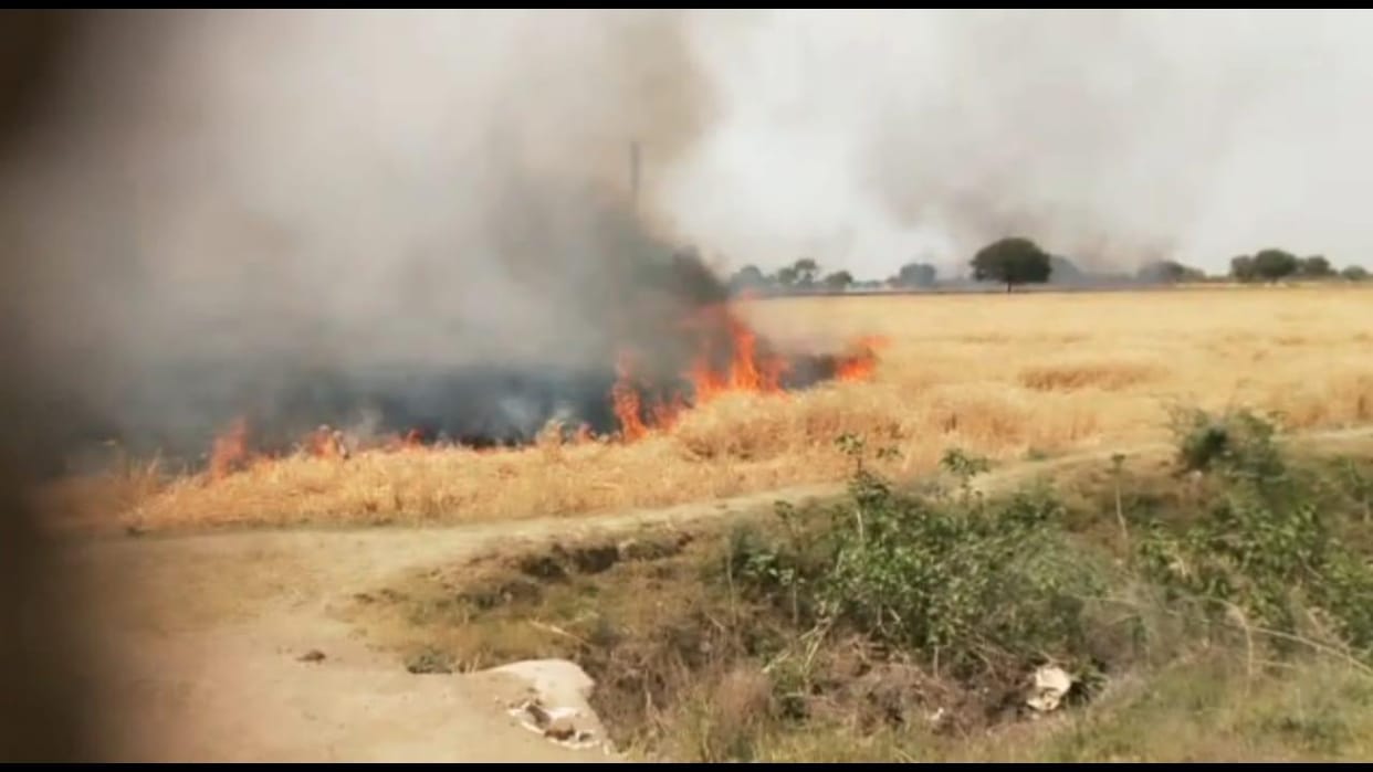 A farm surrounded by flames in At-Kuthund