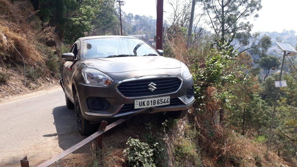 Truck collides with car, car rider narrowly escapes