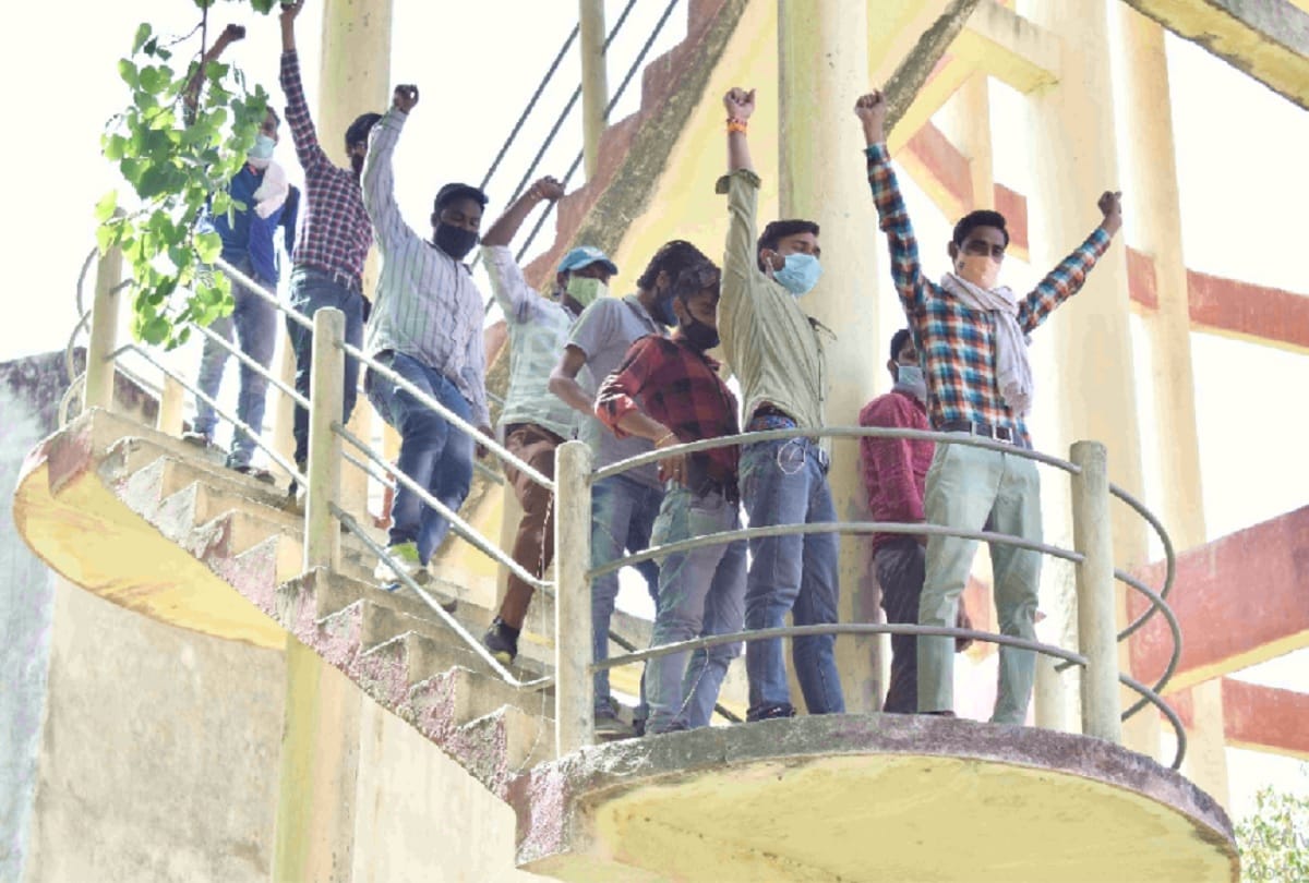 Nine meter readers climb water tank demanding due payments 