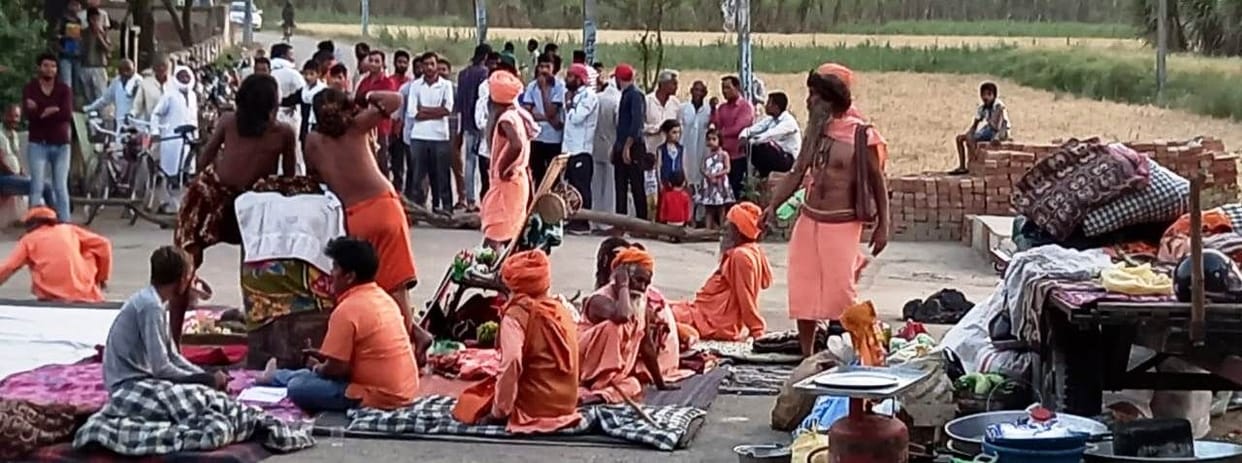 Saints are sitting on the strike site in the scorching sun