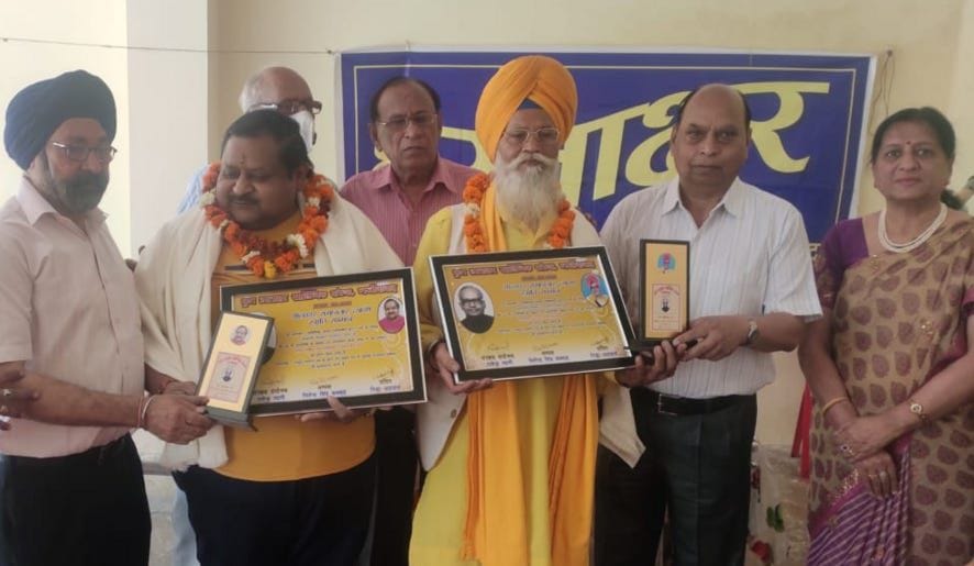 Litterateurs Bhagiratha and Ajay honored