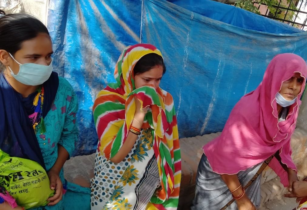 Dead bodies of woman and youth found hanging
