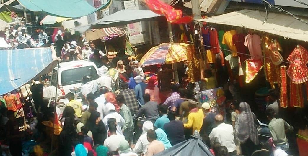 Crowds thronged in the weekly market, neither social distancing nor mask seen