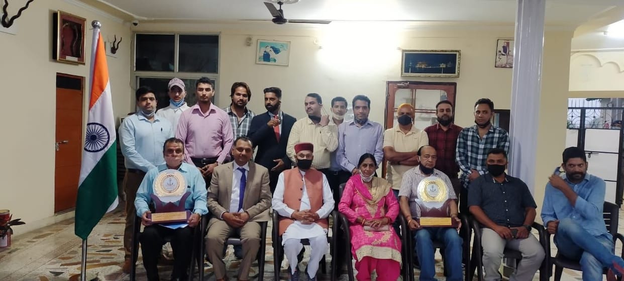 Dhumal honored two brave Indian coast officials