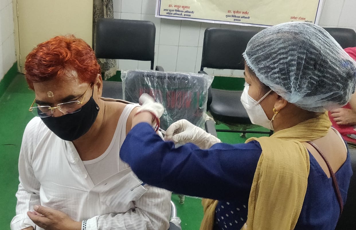 Ramveer Upadhyay's second and his wife's first dose of vaccine.