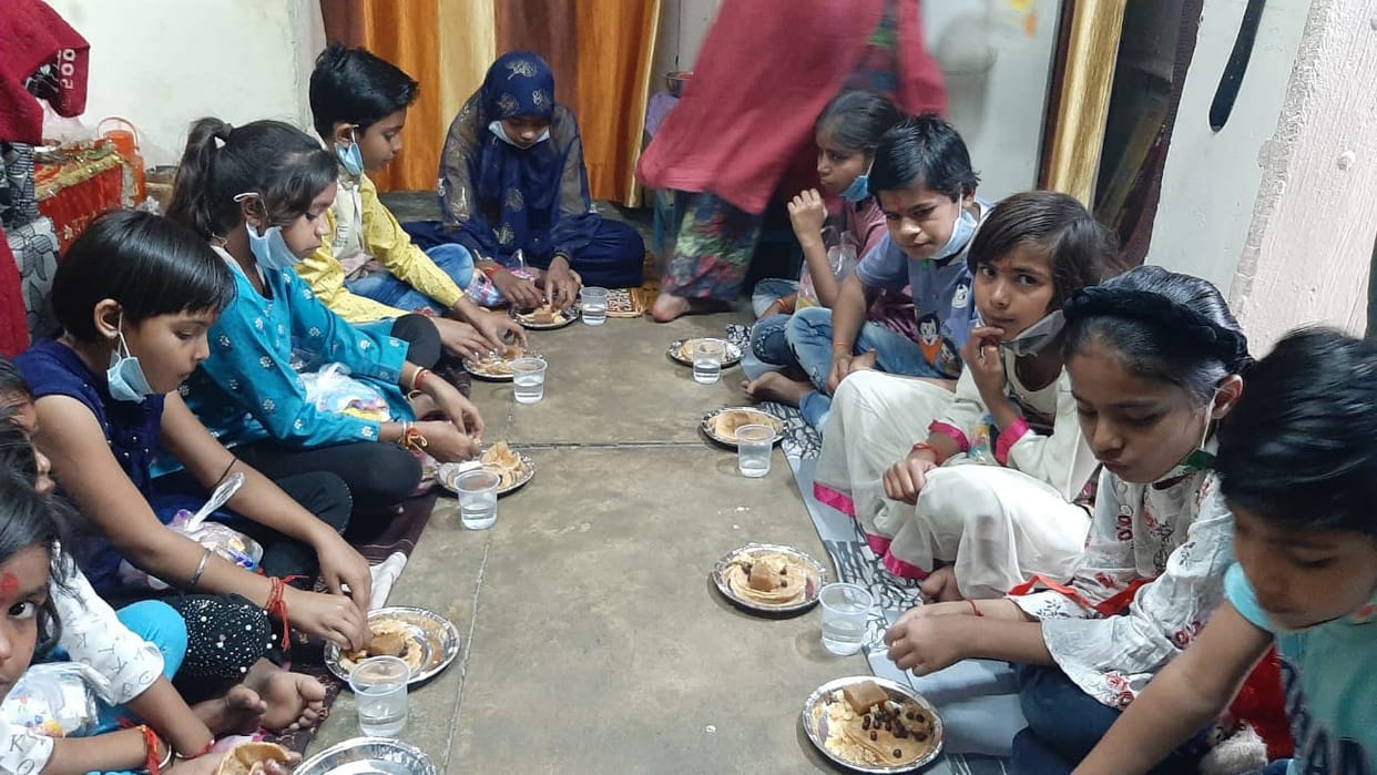 Provided food to girls, blessed by touching their feet