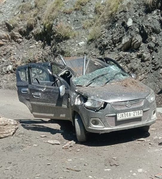 stones fell on car, damaged