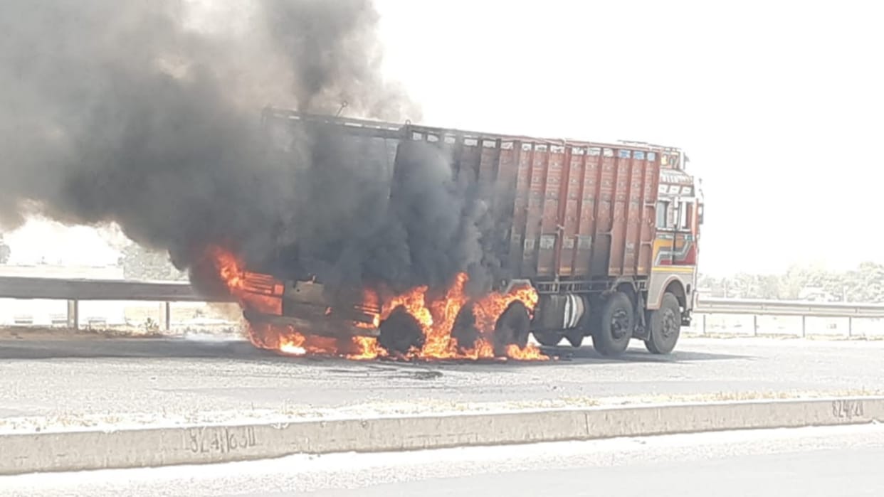 Truck, driver and camp worker saved fire by jumping into fireball
