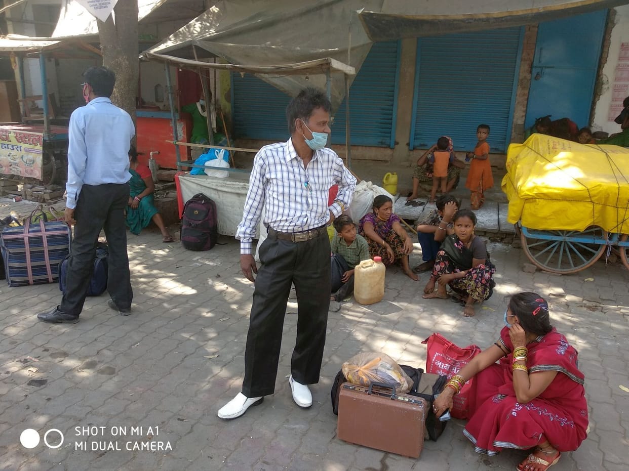 Passengers wandering in the scorching sun for buses