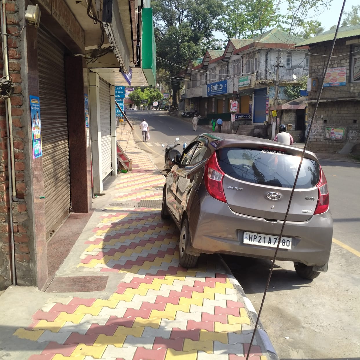 People built a parking lot on the newly constructed sidewalk