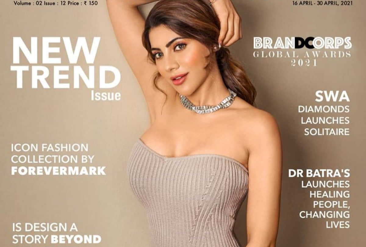 nikki tamboli sultry poses in silver off shoulder dress for fashion magazine