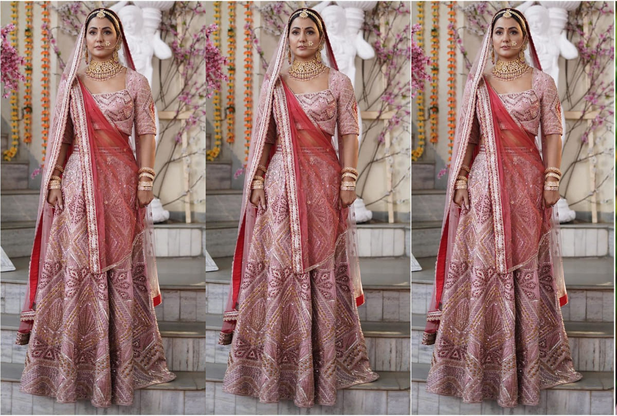 hina khan bridal look in pink lehenga maang tikka and nath like royal