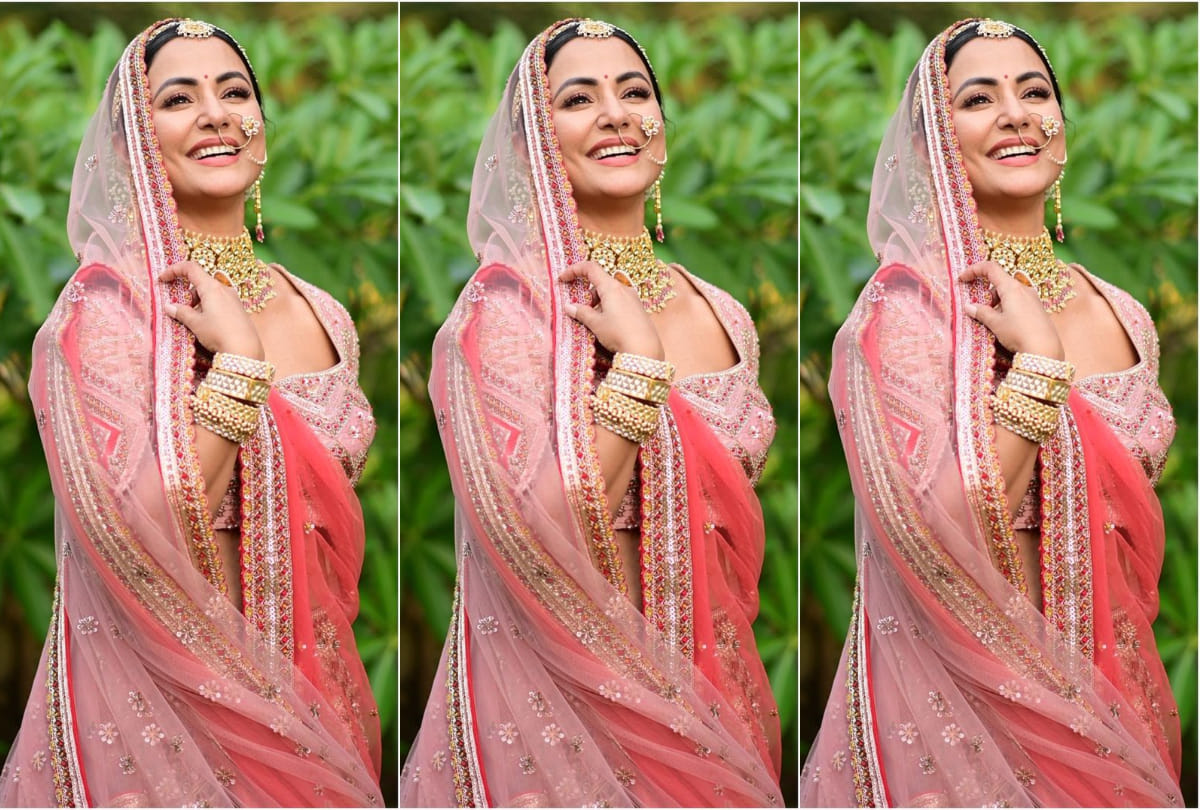 hina khan bridal look in pink lehenga maang tikka and nath like royal