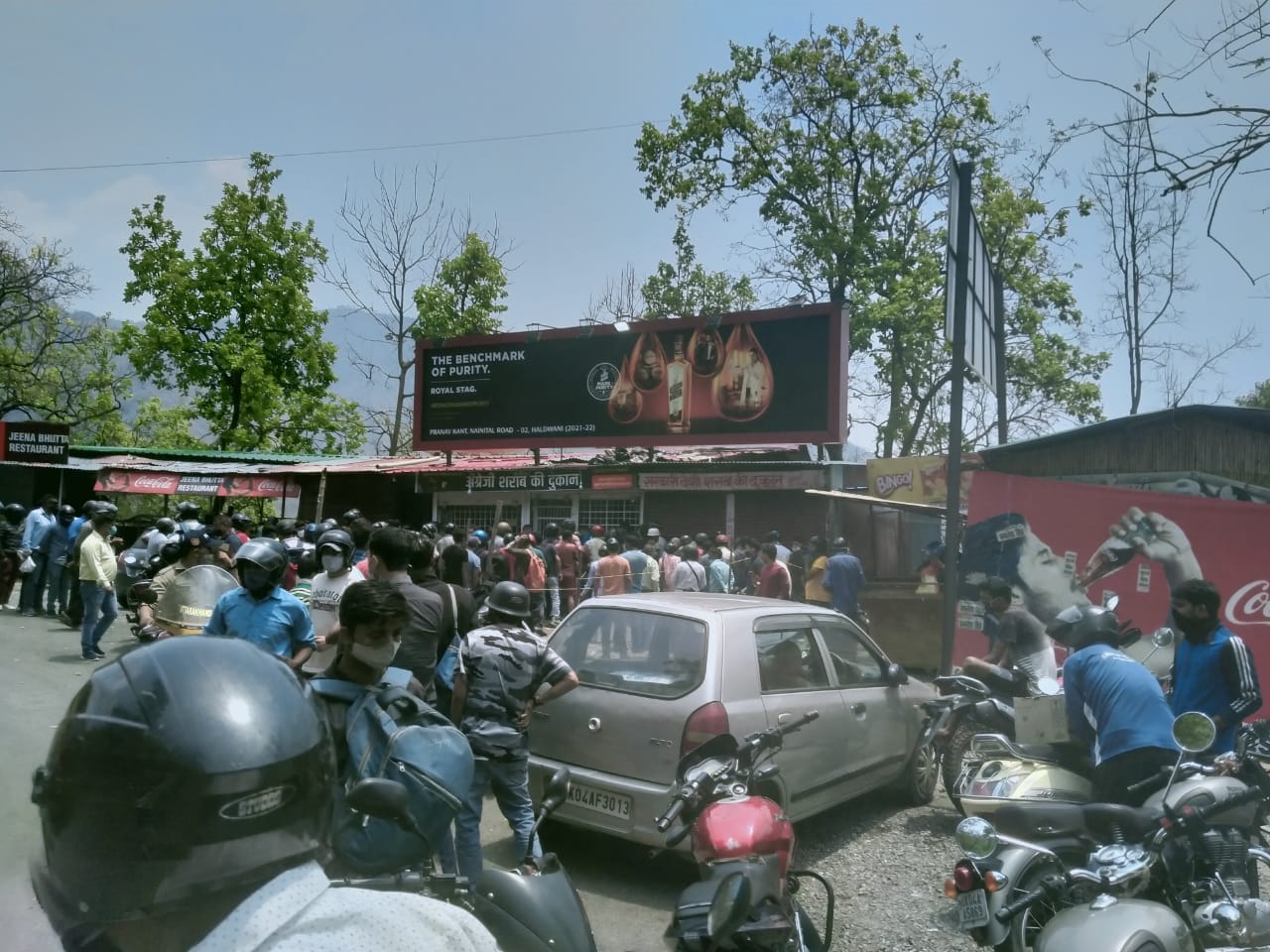 coronavirus in uttarakhand latest news: strict corona curfew extended from 11 to till 18 may, publish rush in market today, photos