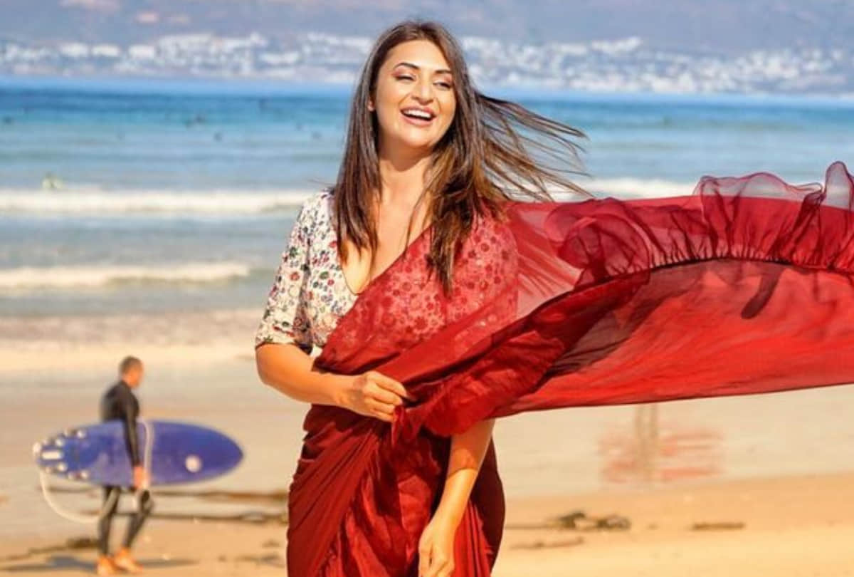 divyanka tripathi show glamorous part in red ruffle saree in capetown beach