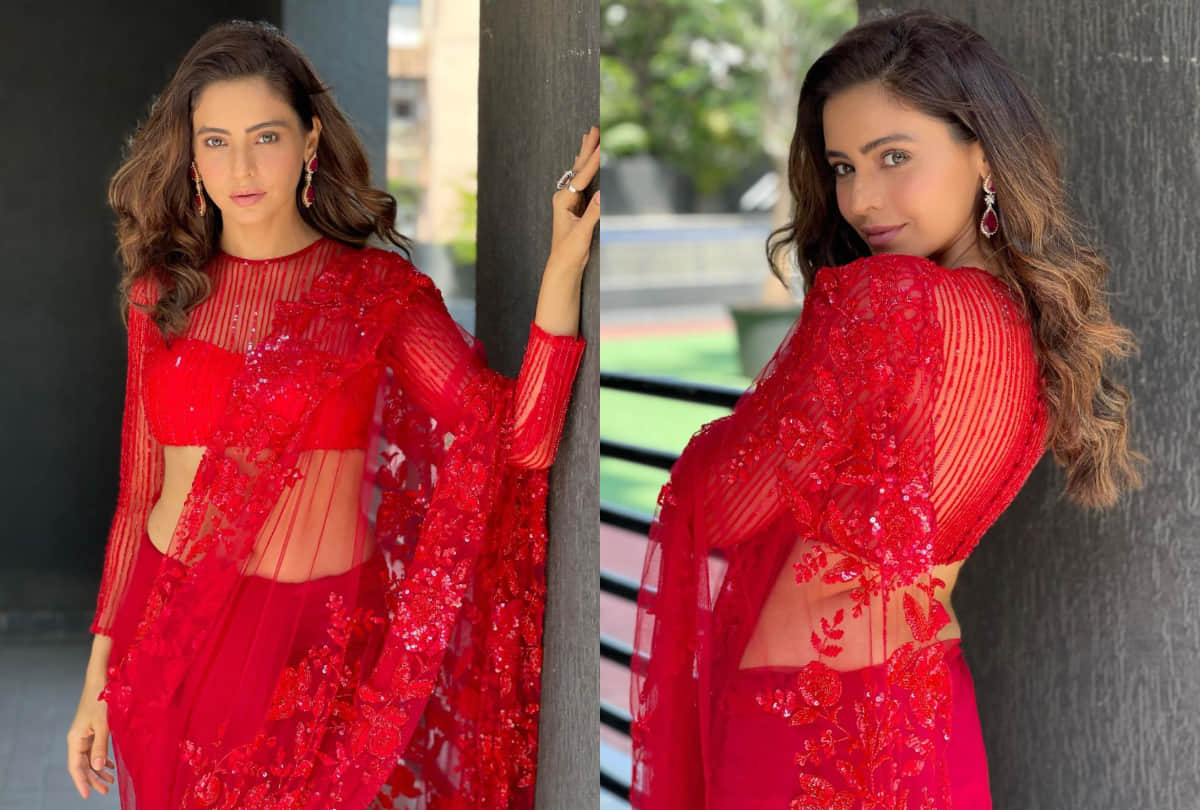 aamna sharif look extremely gorgeous in sheer fabric bright red saree