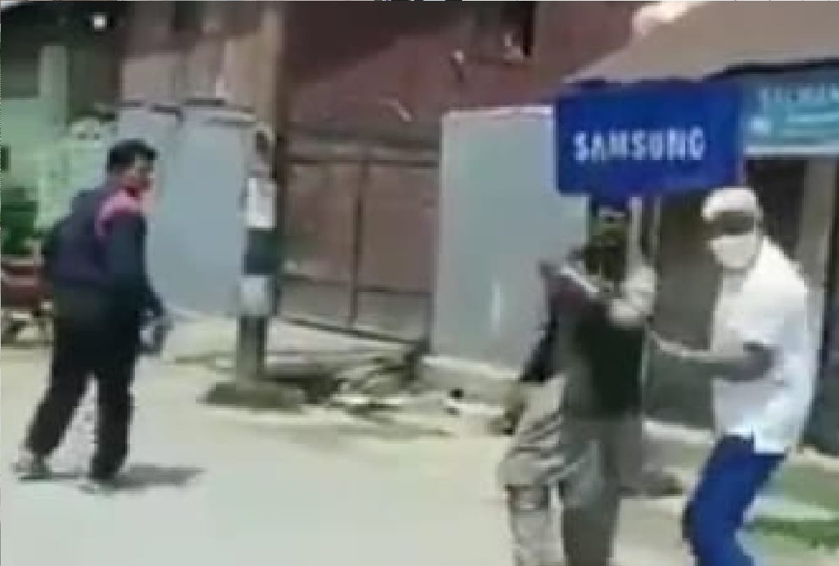 ADC of Baramulla district beats women with sticks during corona curfew