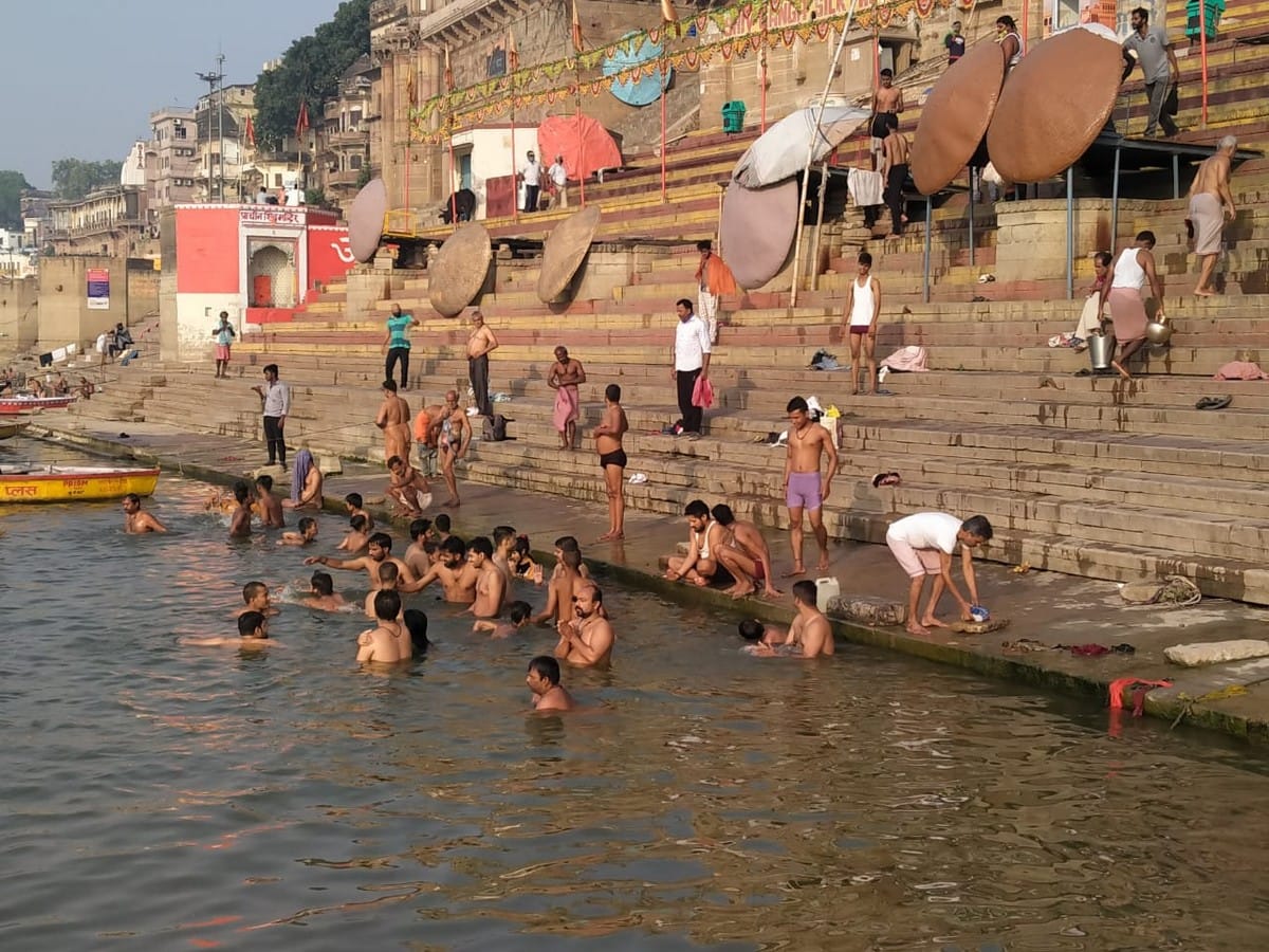 People take dip in ganga on akshaya tritiya in varanasi 