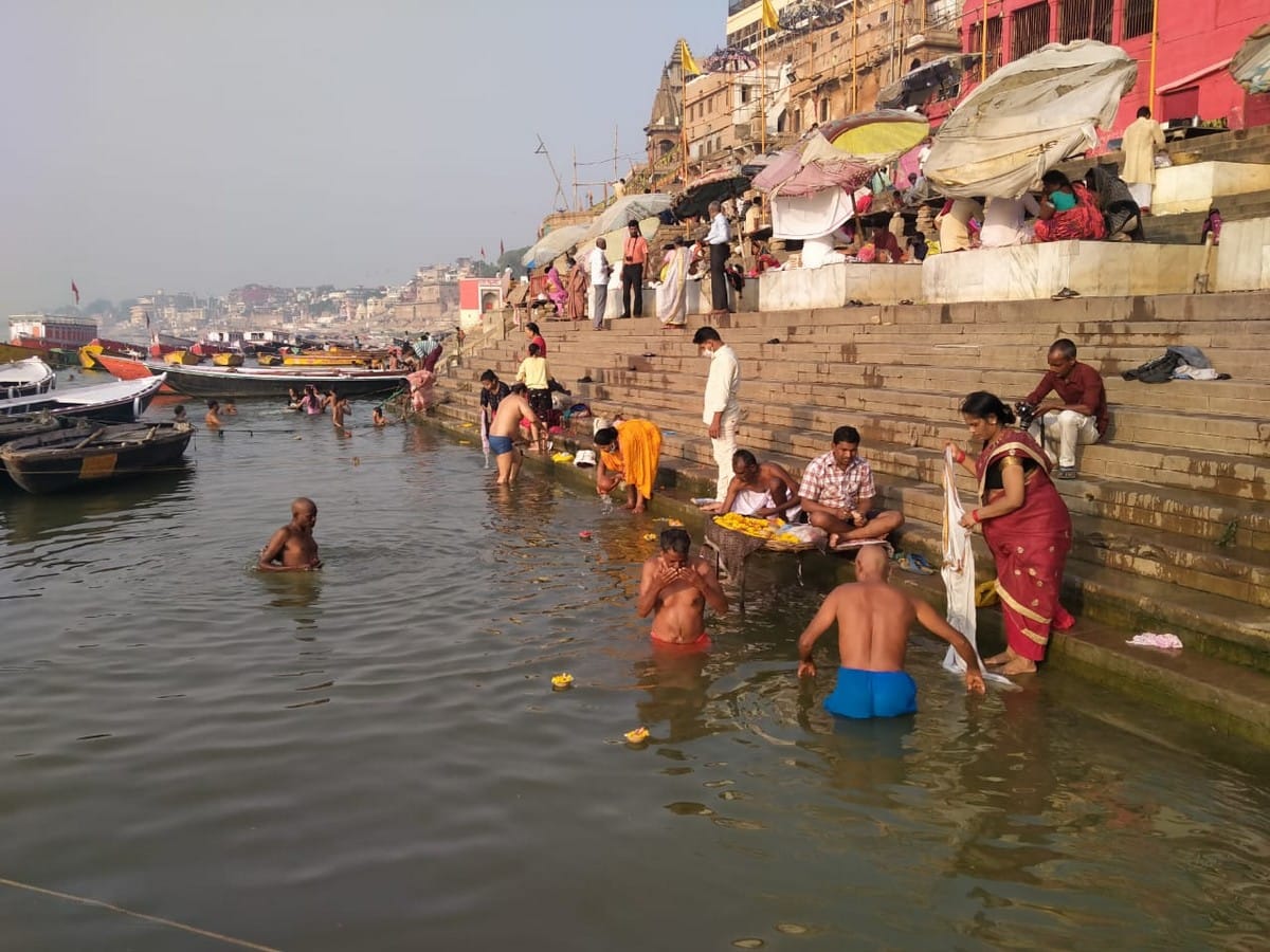 People take dip in ganga on akshaya tritiya in varanasi 