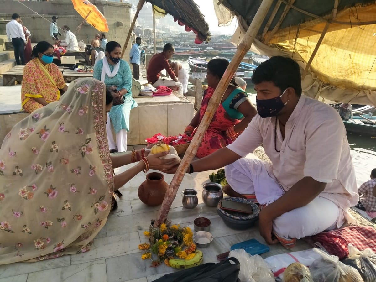 People take dip in ganga on akshaya tritiya in varanasi 