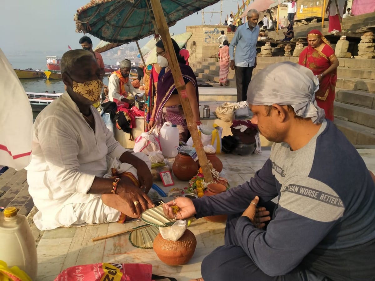 People take dip in ganga on akshaya tritiya in varanasi 