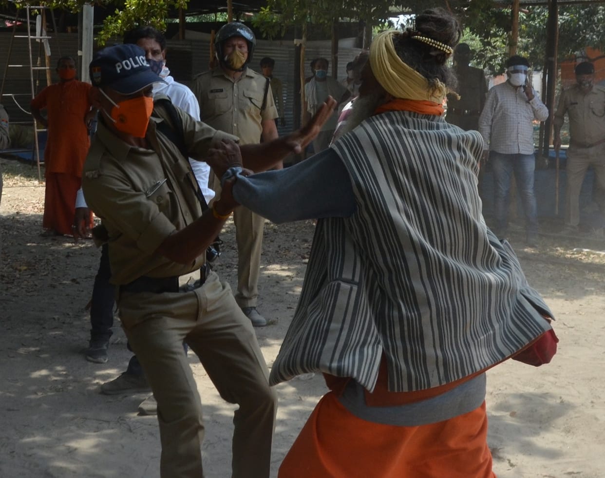 haridwar news: illegal construction collapse in bairagi camp, saint become angry, throw stone on officers, photos