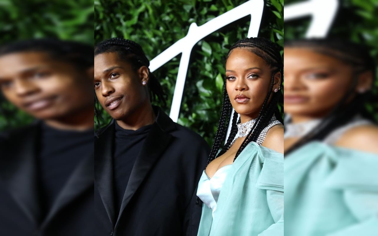 Rihanna is PREGNANT Singer shows off her baby bump