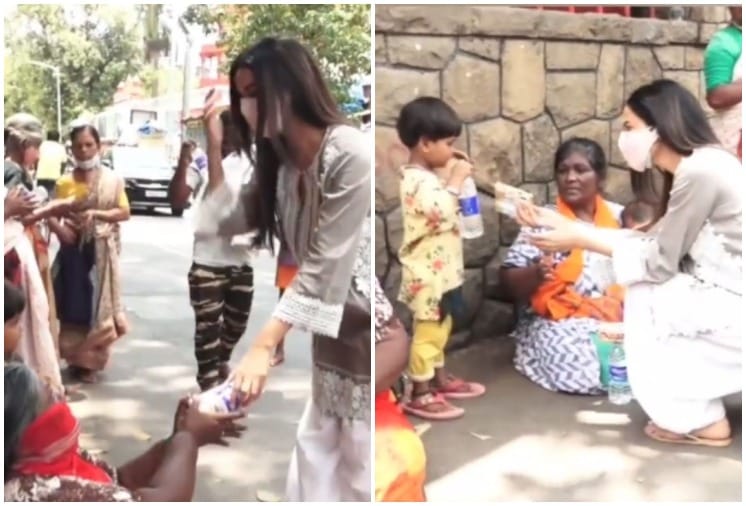 Sonal Chauhan Trolled for Distributing Biscuits to the needy, People Says it Publicity Stunt