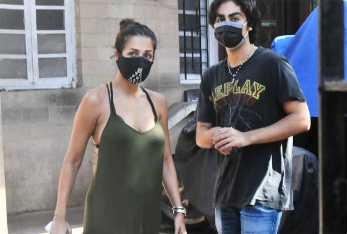 malaika arora spot with son arhaan khan in olive green maxi dress that backless design grab attention