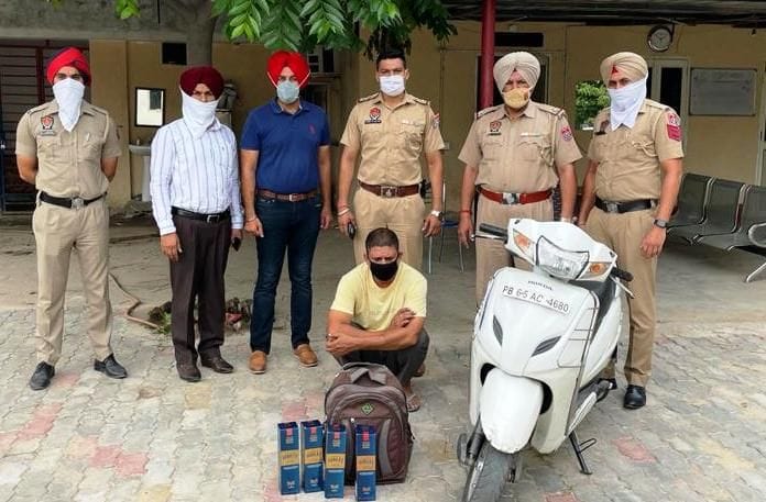 Arrested for carrying illegal liquor on Activa in Kharar