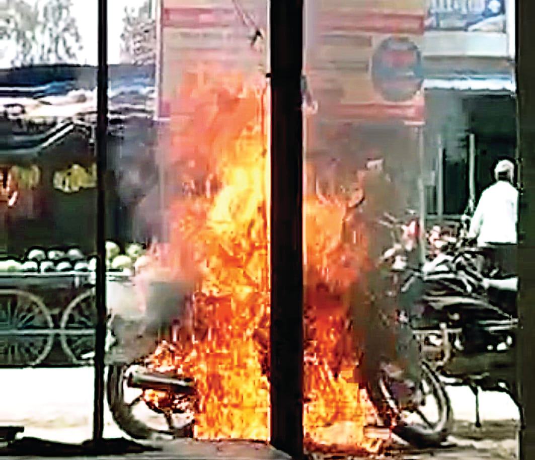 Bike caught fire after breaking high tension  wire