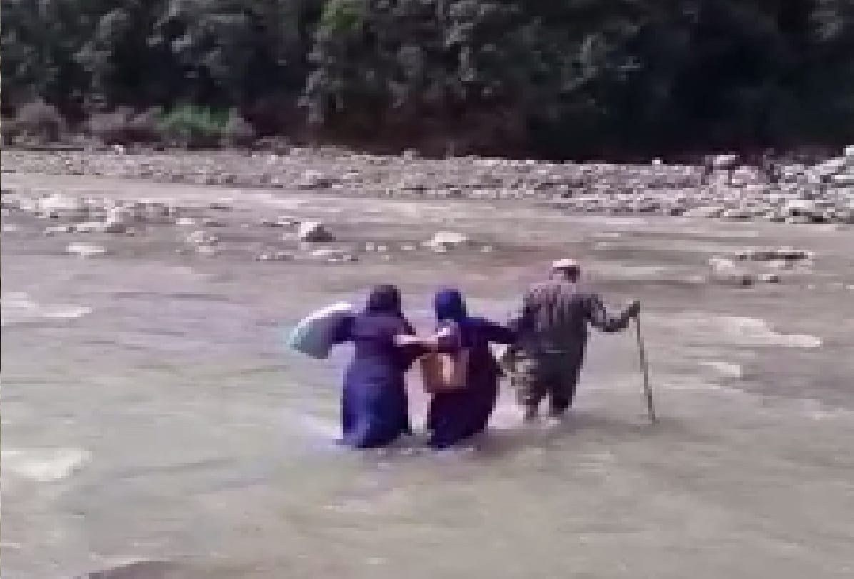 Jammu Kashmir health workers cross river to vaccinate remote areas of Rajouri