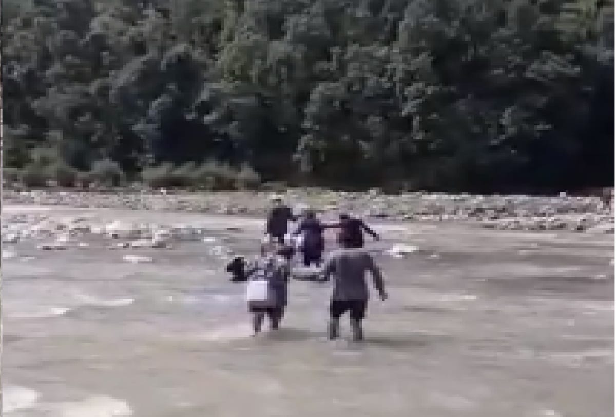 Jammu Kashmir health workers cross river to vaccinate remote areas of Rajouri