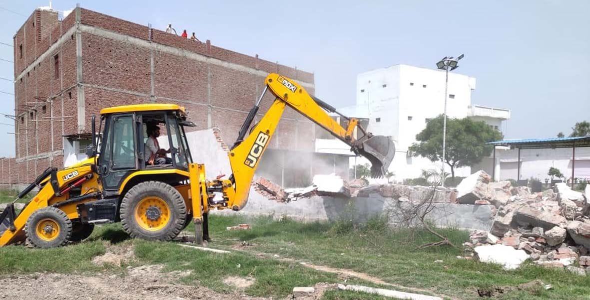 Demolition of wall at Rishi's farm house