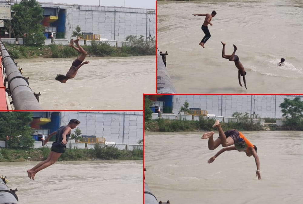 Uttarakhand weather updates: Youth Doing Stunts in Ganga river at har ki pauri photos