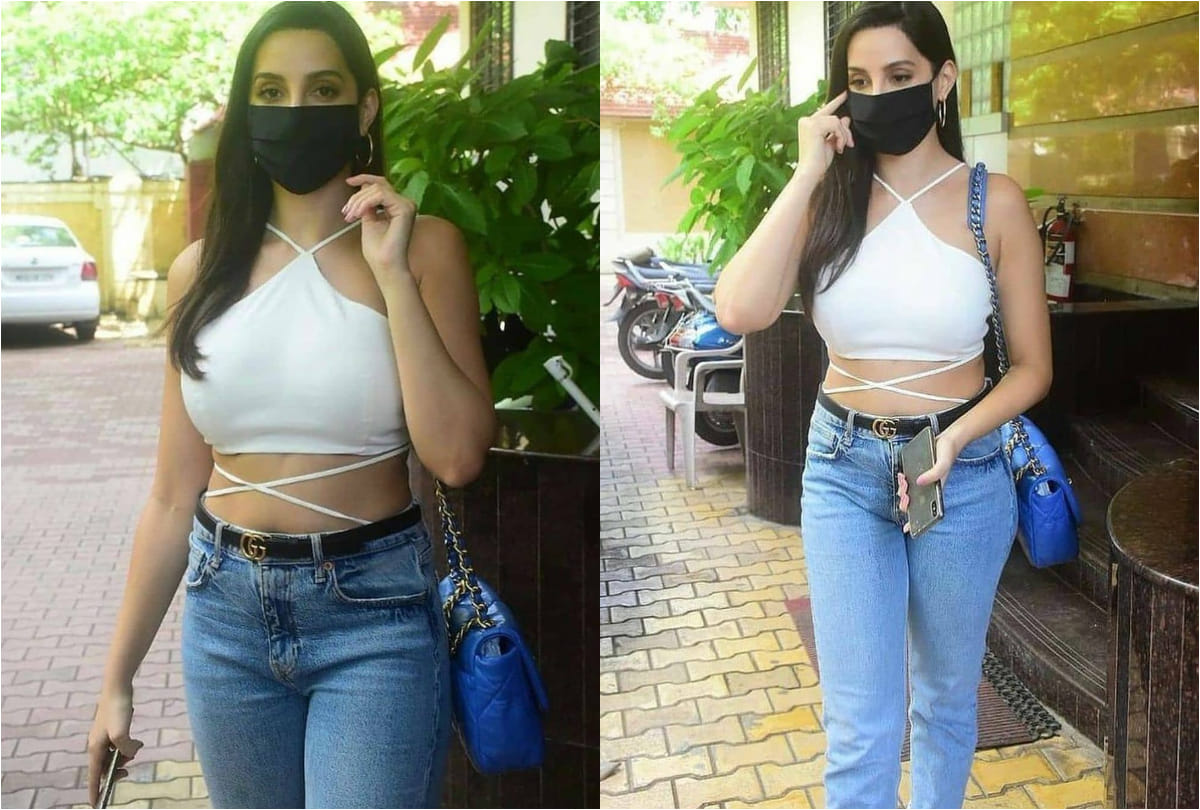 nora fatehi spotted in outside dubbing studio wearing white crop top show her curvy waist